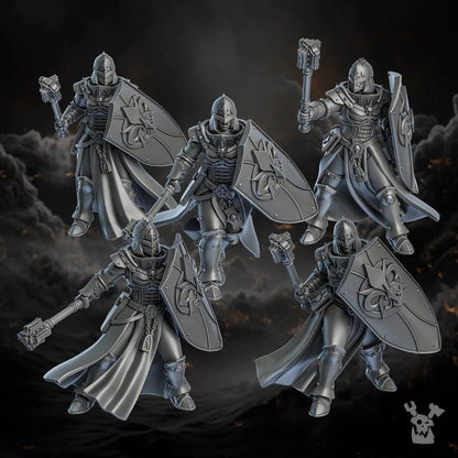 Five metallic gray fantasy warrior figurines with armor and weapons on a dark background